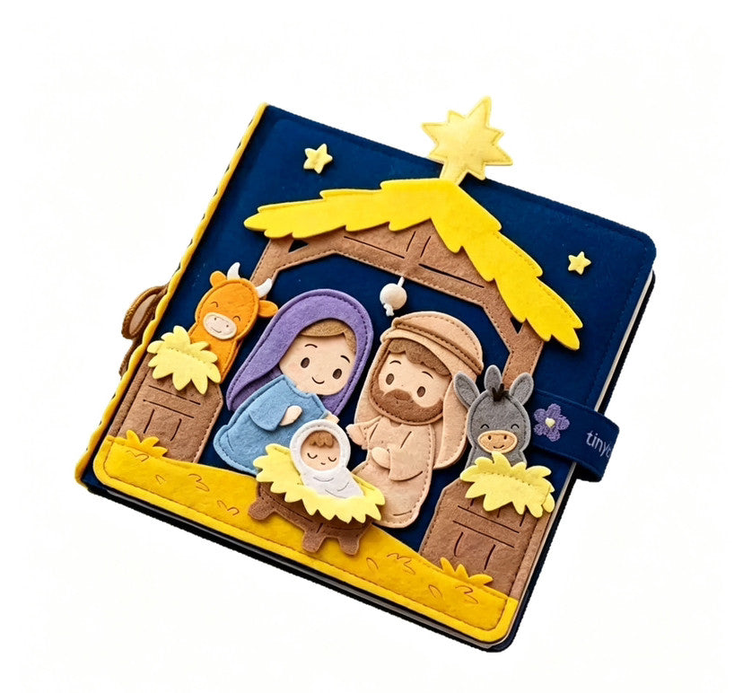Handmade navy felt Nativity quiet book cover with the manger scene, star and elastic strap
