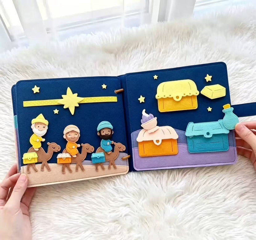 Open felt spread: three wise men on camels beneath the star, with gold frankincense and myrrh chests